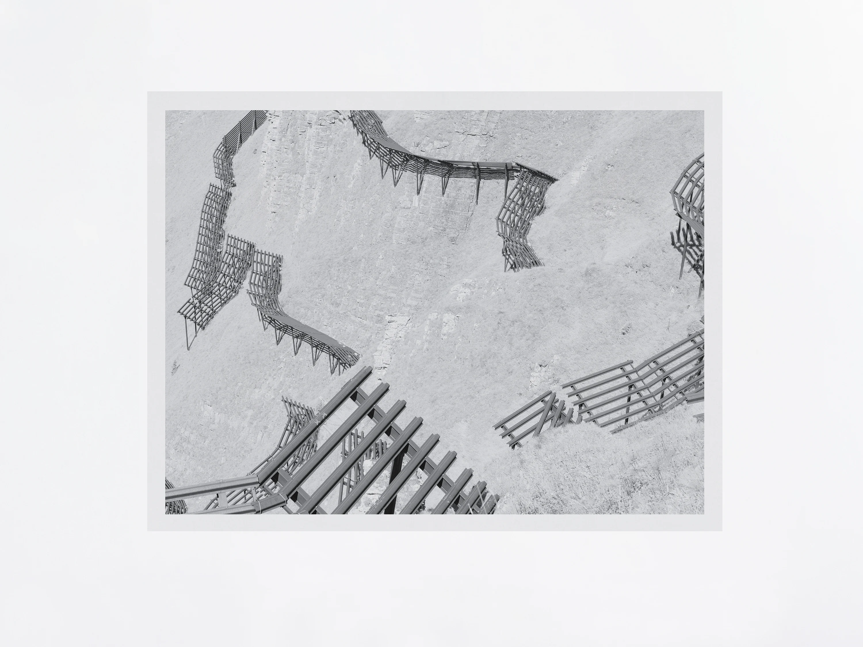 Photograph titled “Snow Fences,” taken in the mountains. A minimalist composition exploring line, structure, and landscape. Martin Schgaguler Martin Schgaguler – Photographs and Thoughts